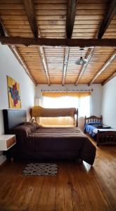 Postel nebo postele na pokoji v ubytování Corazón de Esquel