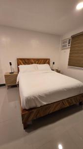 Postel nebo postele na pokoji v ubytování Flat 35, Unit 1F