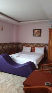 Katil atau katil-katil dalam bilik di Thảo Nguyên 2 Hotel