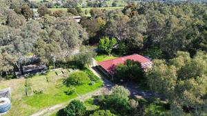 an aerial view of a house with a red roof at 333 chalkhill rd McLaren vale 5171 in McLaren Vale