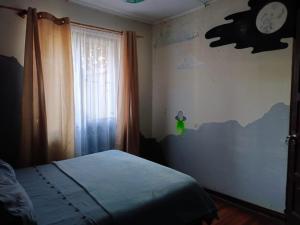 Voodi või voodid majutusasutuse Tipico Hostel Chile toas