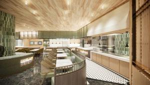 Kuchyň nebo kuchyňský kout v ubytování Birkin International Hotel