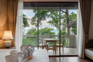 Ein Sitzbereich in der Unterkunft Anda Lanta Resort