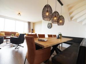 Posezení v ubytování Modern Getaway in Friesland