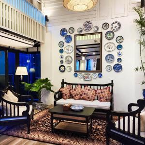 Posezení v ubytování Siraburi boutique pool villa at Center of old town