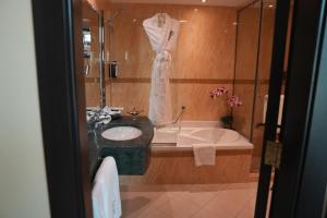 Koupelna v ubytování AG Hotel