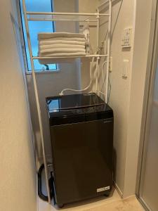 Letto o letti a castello in una camera di Shinjuku 新宿区地下鉄駅まで徒歩4分