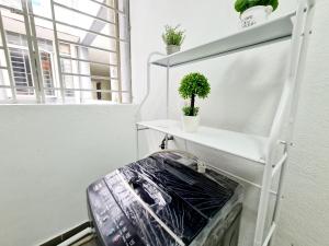 Postel nebo postele na pokoji v ubytování 10 Guest Breezy 3 Room Koi Kinrara Suite, IOI Puchong, Bukit Jalil Pavilion, Bukit Jalil Stadium, Sunway Pyramid, Sunway Lagoon
