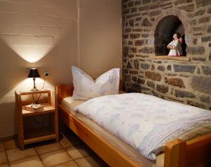 Krevet ili kreveti u jedinici u objektu Hotel Haus Kylltal