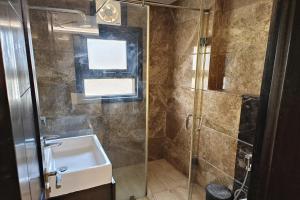 Koupelna v ubytování Hotel A10 International