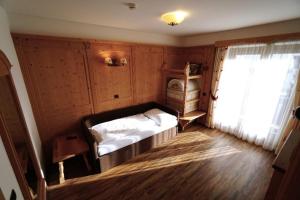 Posteľ alebo postele v izbe v ubytovaní Garni Hotel and Apartments Wildbach