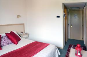Postel nebo postele na pokoji v ubytování Hotel Bassetto