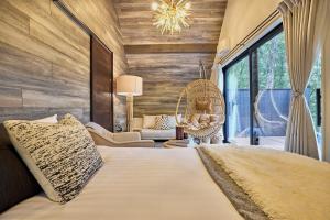 Katil atau katil-katil dalam bilik di SAUNA FOREST CABIN 軽井沢 御代田 C棟 Bettei