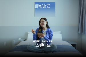 Aank Air Hotel Jinjuseong客房内的一张或多张床位