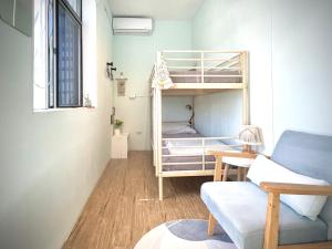 Postel nebo postele na pokoji v ubytování 都蘭朋友家 Dulan Friends Hostel