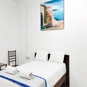 Fotografie z fotogalerie ubytování RedDoorz at Cbreez Bitung v destinaci Bitung