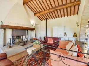 a living room with a couch and a fireplace at Comfortable apartment with stunning views, near hot springs in Celle sul Rigo +94 photos