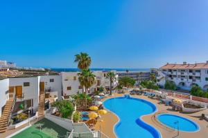 an aerial view of a resort with a swimming pool at Happy Home by Olax Rentals in Callao Salvaje