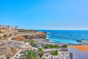 a view of the beach and the ocean at Happy Home by Olax Rentals in Callao Salvaje