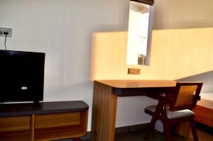 TV a/nebo společenská místnost v ubytování Bir Valley Retreat