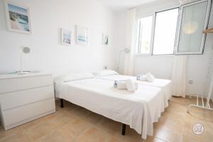 Postel nebo postele na pokoji v ubytování Casa Chloe