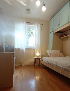 Postel nebo postele na pokoji v ubytování Casa Moreda Vodnjan