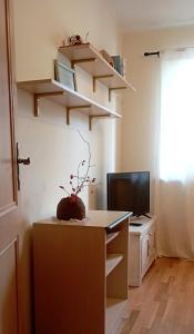 TV a/nebo společenská místnost v ubytování Casa Moreda Vodnjan
