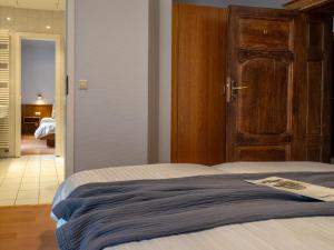 Letto o letti in una camera di Hotel Heintz