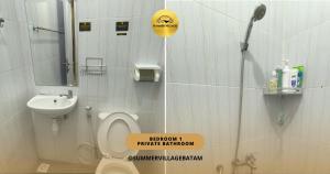 a small bathroom with a toilet and a sink at Bona H2A 5BR - Summer Veluxe in Batam Center