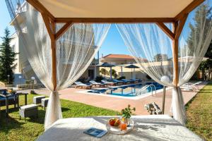 The swimming pool at or close to Kallithea Breeze Luxury Villa