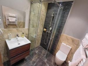Ein Badezimmer in der Unterkunft Old Avenue Hotel