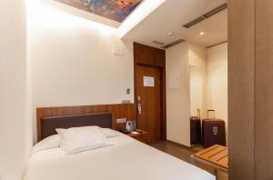 Postel nebo postele na pokoji v ubytování Hotel Abades Recogidas