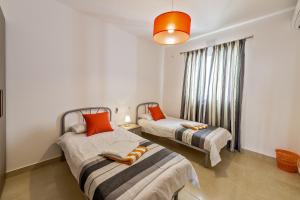 Letto o letti in una camera di Hillock Residence Apartments