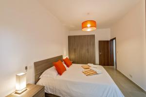 Letto o letti in una camera di Hillock Residence Apartments