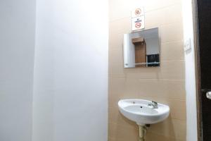 Koupelna v ubytování Apartmen Kak Okoh