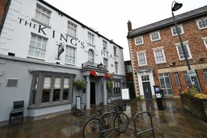 a bike parked in front of a building at The King's Head in Beverley
