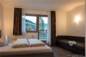 Posteľ alebo postele v izbe v ubytovaní Appartments Gerlos Am Bach - Riverside