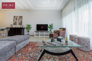 TV a/nebo společenská místnost v ubytování Prime Select Lake View