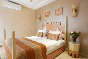 Ένα ή περισσότερα κρεβάτια σε δωμάτιο στο Palais Zahia Hotel & Spa +68 φωτογραφίες