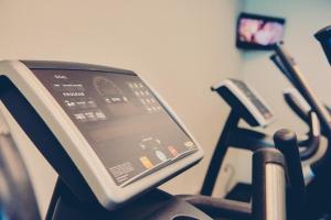 a monitor on a treadmill in a gym at South Congress Hotel in Austin