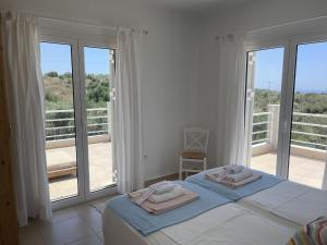 Posteľ alebo postele v izbe v ubytovaní Villa in Finiki with Stunning Sea Views