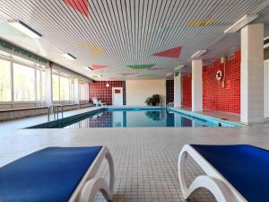 a large swimming pool in a building at Appartement Peter in Freyung im Bayerischen Wald in Freyung