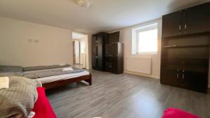 Postel nebo postele na pokoji v ubytování Apartmánový dom Most pri Bratislave