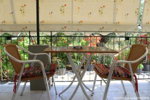 A balcony or terrace at Rentoulia Apartments