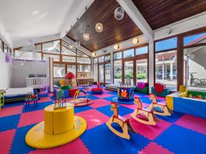 a childrens play room with a colorful floor at Mobile Home by Novalja Beach with Pools in Novalja