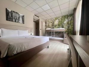Postel nebo postele na pokoji v ubytování Best Quality Hotel La Darsena + 28 fotografií