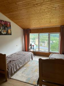 Postel nebo postele na pokoji v ubytování Nadia Guesthouse