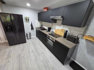 Kuchyň nebo kuchyňský kout v ubytování Havel Suites