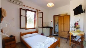 Posteľ alebo postele v izbe v ubytovaní Diamanti Molivos Studios & Apartments + 37 fotografií