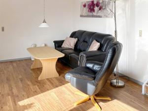 Posezení v ubytování 4 person holiday home in Thyborøn-By Traum
